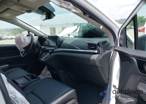 2025 Honda Odyssey Touring z USA, uszkodzony, nr VIN 5FNRL6H87SB001310